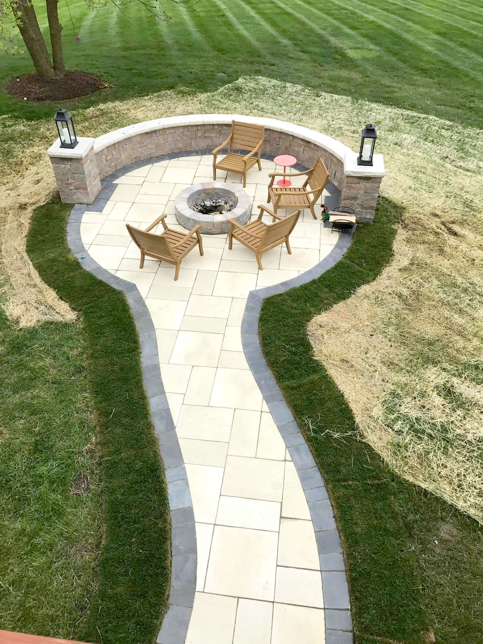 patio and fire pit designed by All American