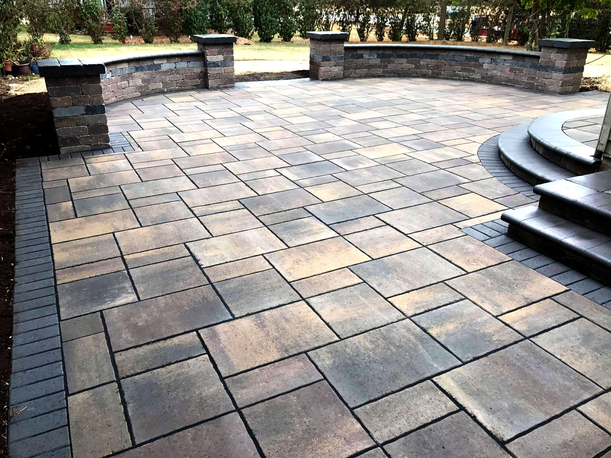 brick patio installed by All American Landscape & Hardscape